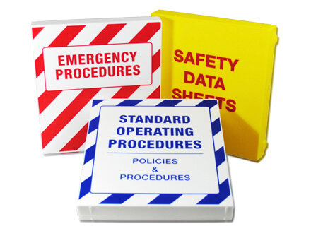 A collection of safety binders grouped neatly