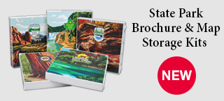 A collection of State Park Brochure And Map Storage Kits on display
